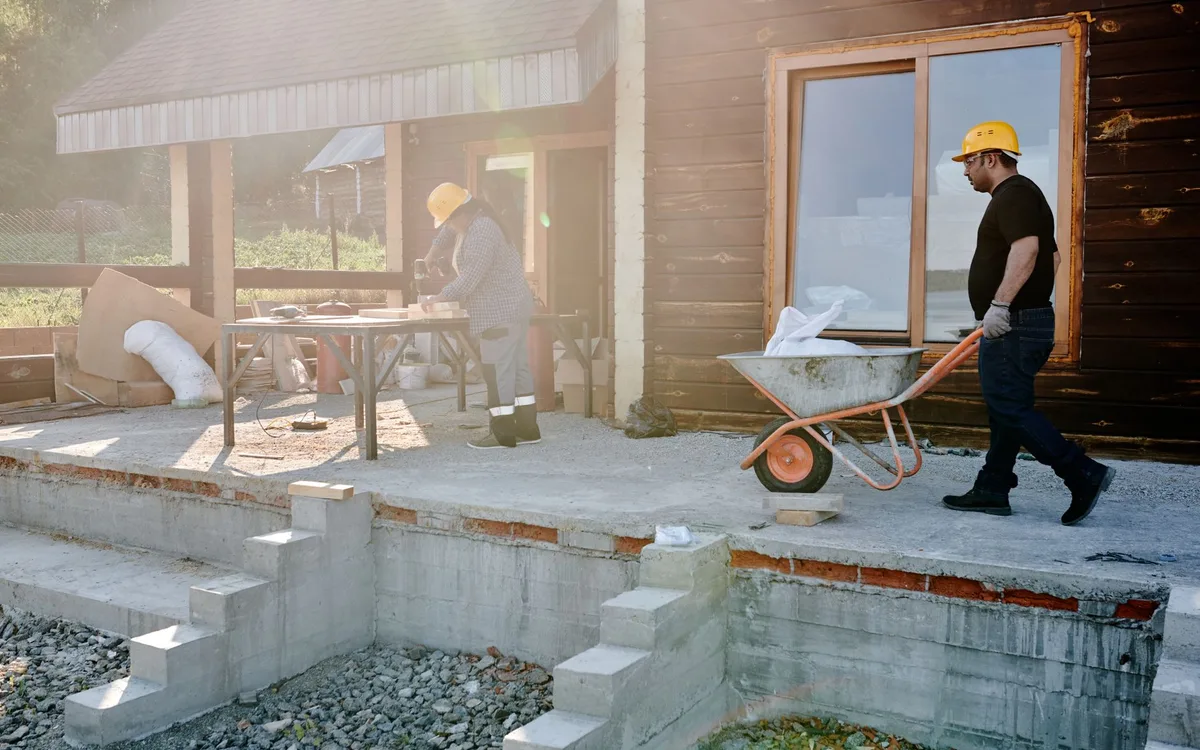 Builders at work on a residential construction site