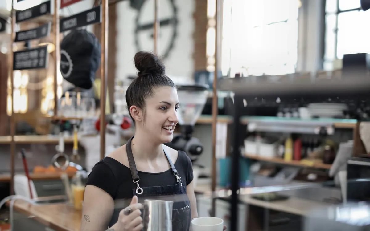 A hospitality worker in a cafe.