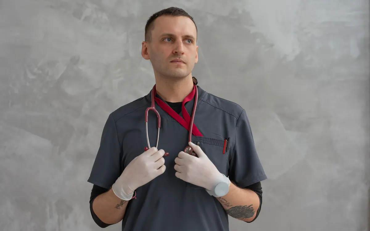 A doctor with a stethoscope in a hospital.