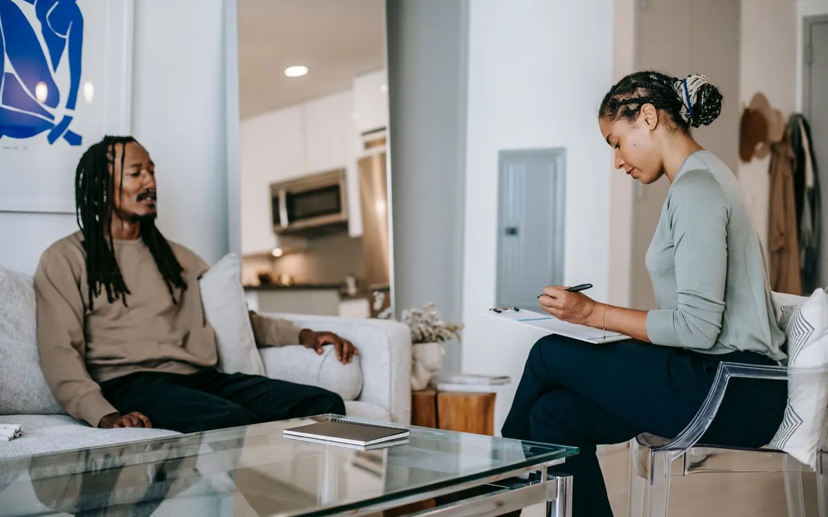 A therapist in a counselling session.